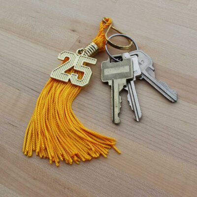 gold tassel keychain with 2025 year date